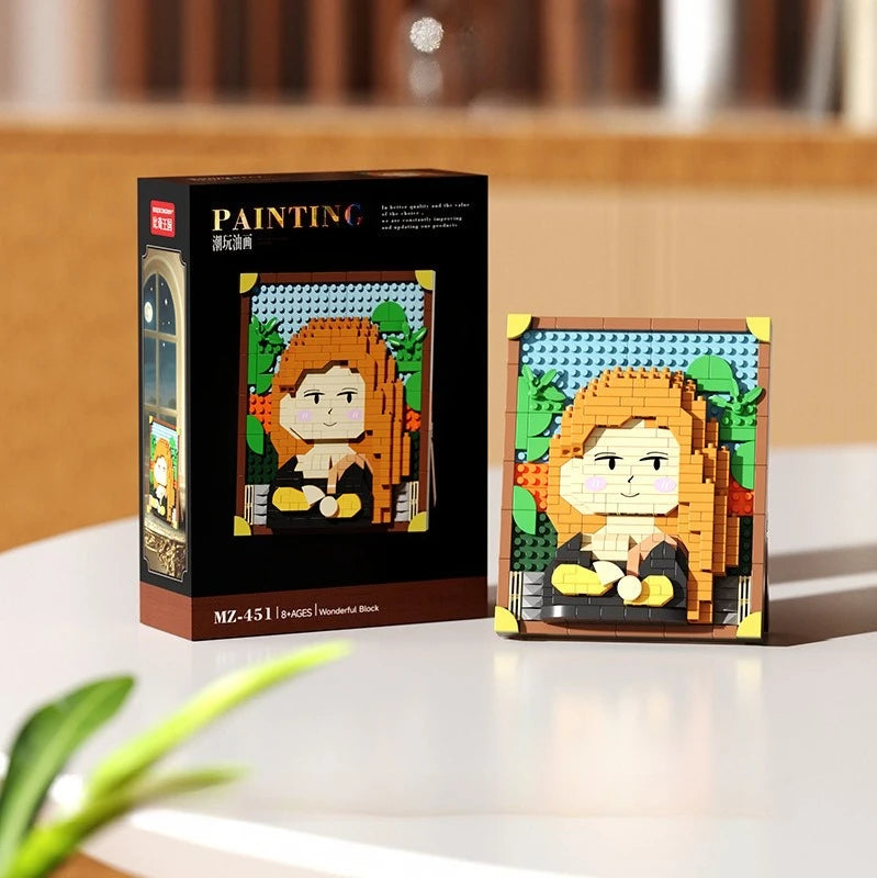 A box and a finished pixel art building block featuring an orange-haired woman.