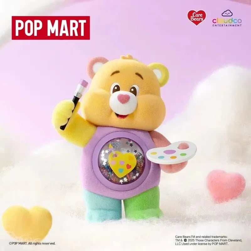 A yellow Care Bear figurine with purple clothing and a heart-shaped accessory is shown against a white fluffy background.