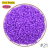 A pile of 5mm purple beads, 500 pieces, used for creative fuse bead craft kits.