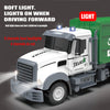 A white truck is shown with green cargo, featuring light bars and a red LIGHT label.