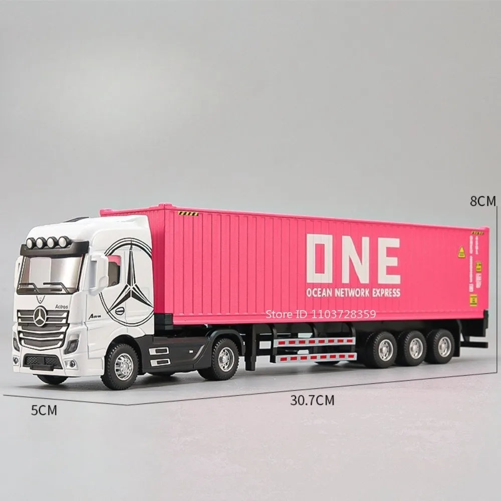 A pink and white Mercedes-Benz truck model with a container, featuring multiple axles and details.