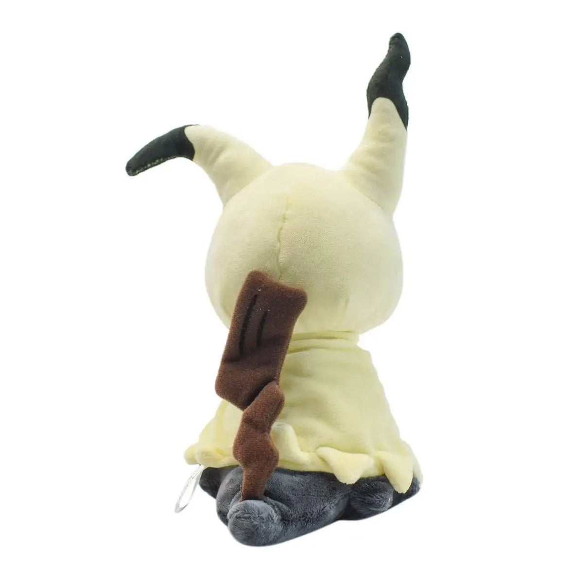A soft collectible plush toy of Mimikyu featuring light yellow fur and dark accents.