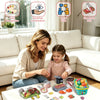 A woman and a girl play with a kids pretend play kitchen set featuring fruits, vegetables, and cookware.