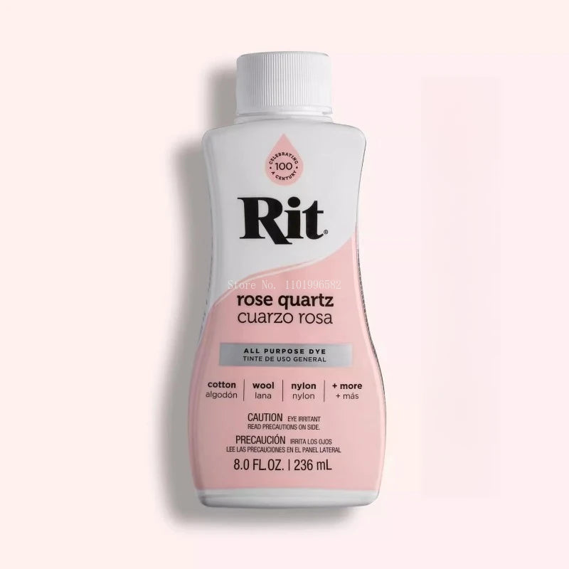 A bottle of Rit Rose Quartz multi-purpose fabric dye with a white cap and pink liquid.