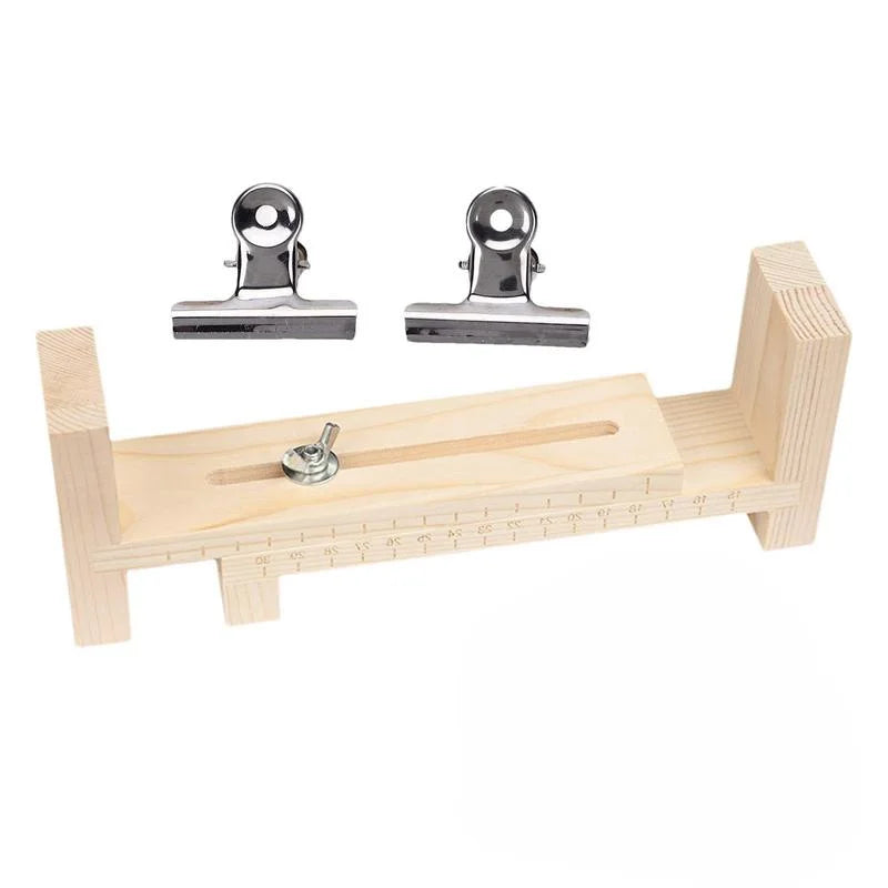 Adjustable wooden bracelet weaving jig with metal clips and a wooden board