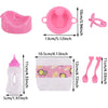 A set of pink doll feeding and care accessories including a bowl, a silicone ring, a dropper bottle, and two pink spoons.