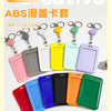 A collection of colorful ABS plastic ID badge holders with metal keychains and clips displayed in various shades.