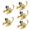 A set of light beige marine animal building blocks including a shark, octopus, and whale.