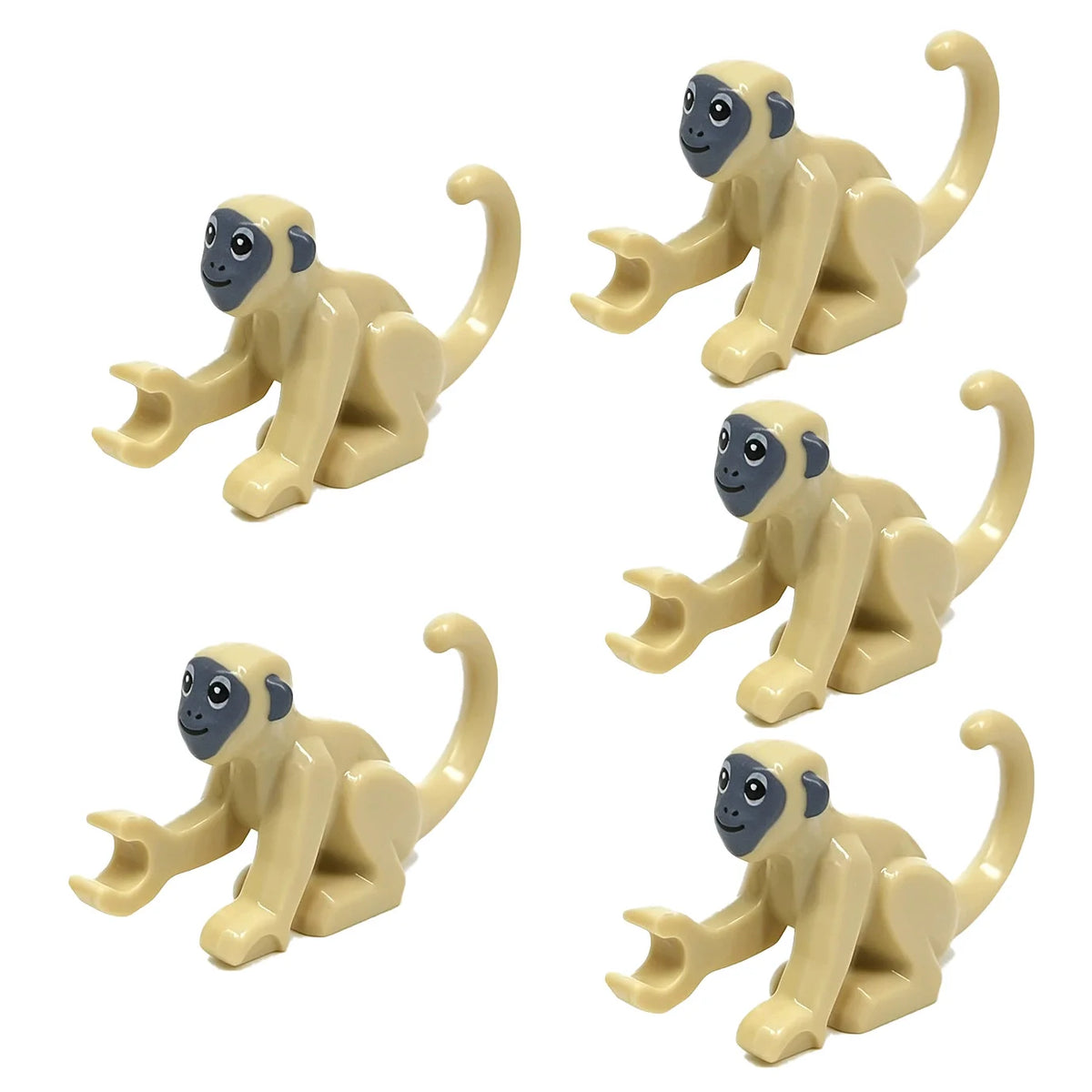 A set of light beige marine animal building blocks including a shark, octopus, and whale.