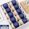 A box of YEDAN MERIN worsted wool thread yarn balls for knitting projects