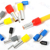 A collection of various colored insulated tubular crimp terminals for electrical wiring.