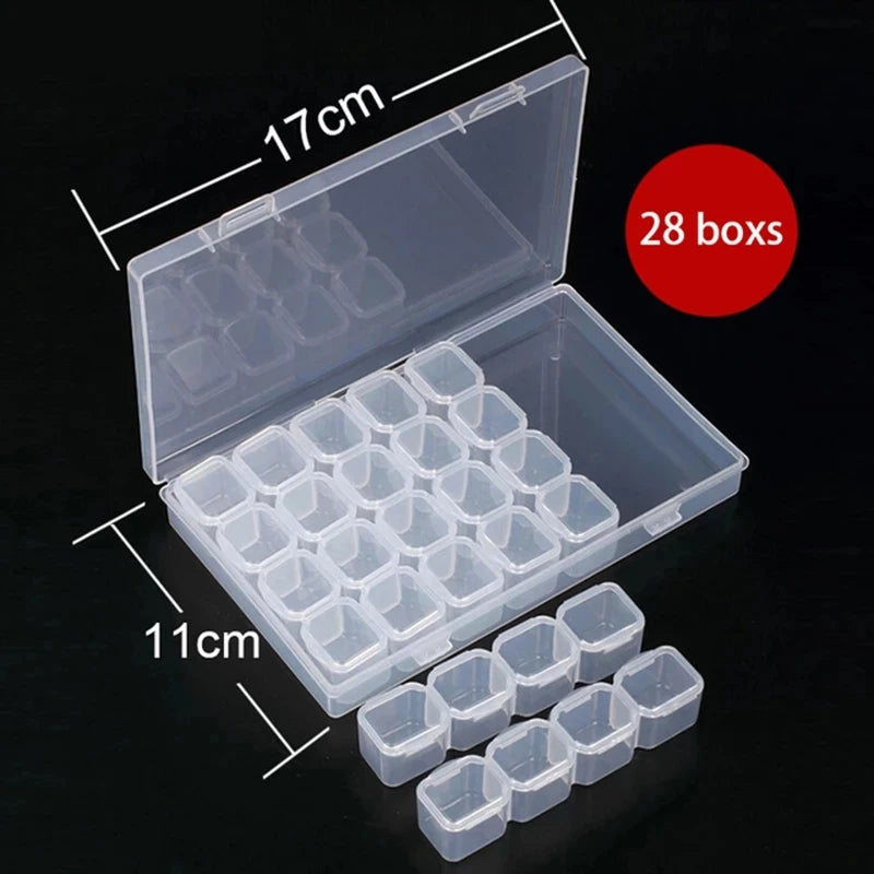An open clear plastic storage box with multiple compartments and several individual boxes shown next to a measurement scale.