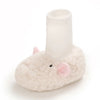 A pair of soft, white cartoon baby booties with a white cuff and pink accents.