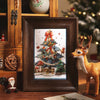 A framed illustration of a Christmas tree decorated with stars and gifts, set in a dark wooden frame.
