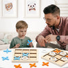 A wooden tic tac toe board game with various colored wooden pieces laid out on a white table.