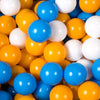 A close-up view of a bulk set of colorful plastic ocean ball pit toys in various shades of yellow, white, and blue.