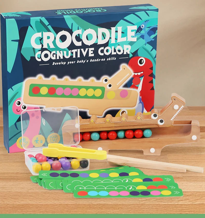 A box of Crocodile Cognitive Color wooden test tube clip beads for developing a baby's hand-on skills.