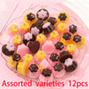 Assorted varieties of pudding-shaped resin pendants for DIY jewelry making in pink and yellow colors