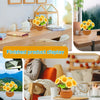 Finished product display of a DIY potted plant crochet kit with video tutorials for beginners featuring yellow flowers.