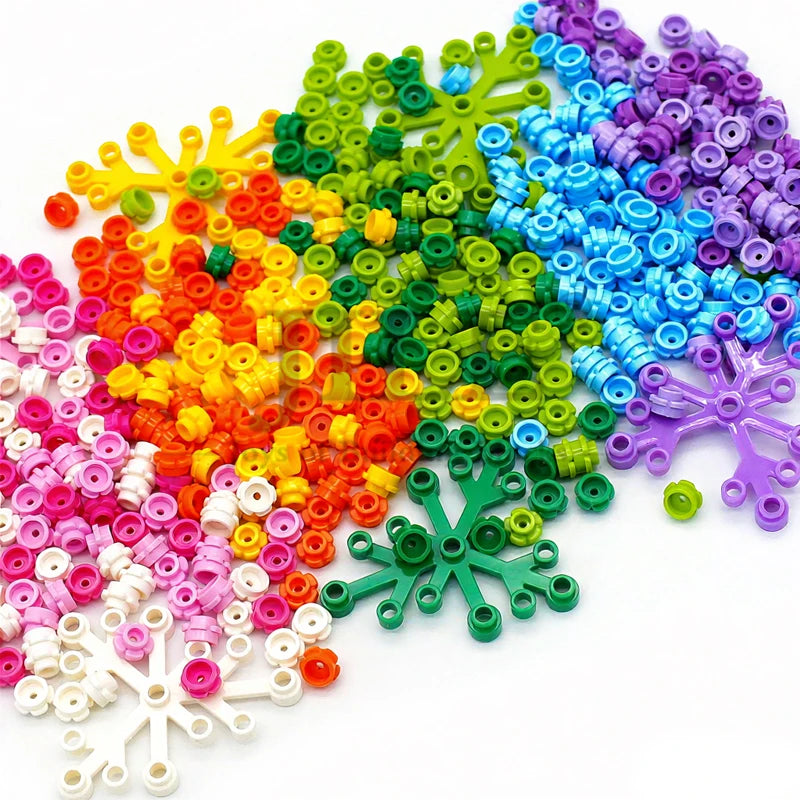 A colorful assortment of small, round building blocks in various shades of green, yellow, orange, pink, and purple.