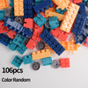 A pile of 106 random colored plastic stacking blocks for educational play