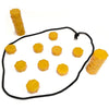 A set of yellow magnetic soccer strategy board game pieces arranged in a line and scattered on a white background.