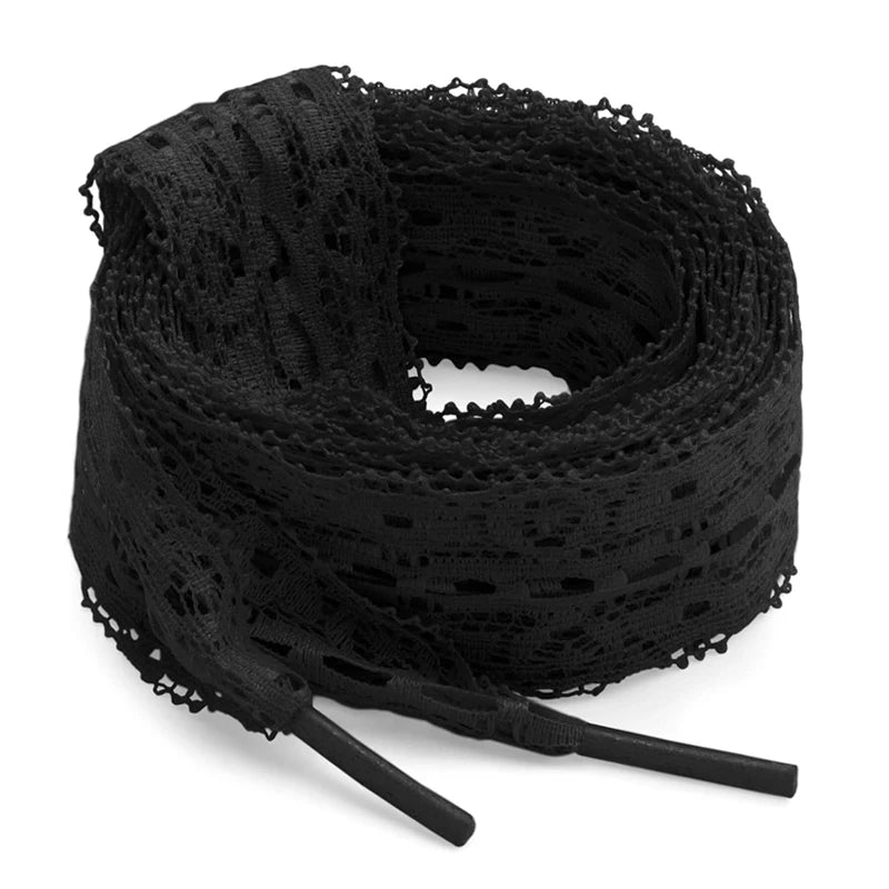 Black flat elastic silk lace shoelaces coiled and with tips visible