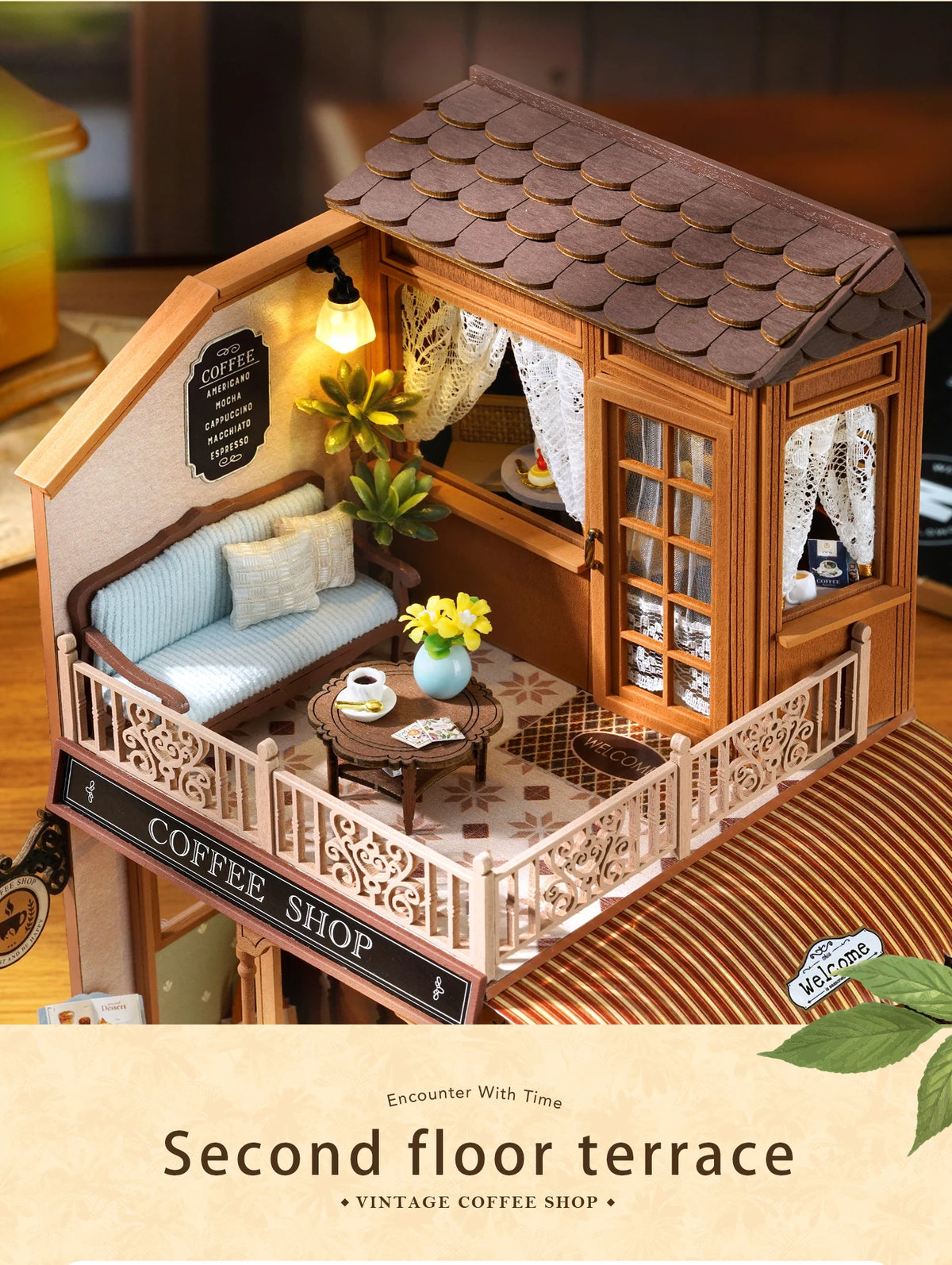 A wooden miniature dollhouse kit of a coffee shop with an open facade and a second-floor terrace view.