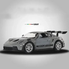 A gray Porsche 911 GT3 RS diecast model car shown in a side profile view.
