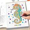 A hand is using a black pen to color a spiral design with colored dots in a dot art coloring book.