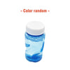 A clear blue liquid in a glass bottle with a white cap, used as context for a DIY craft kit.