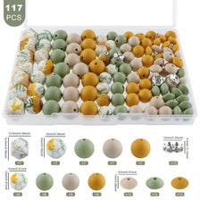 A variety of hexagonal and round beads in various colors including yellow, green, beige, and white, some with rhinestones, ar