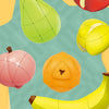 A collection of colorful, fruit-shaped 3x3 puzzle cubes including a green pear, pink apple, yellow lemon, and orange melon.