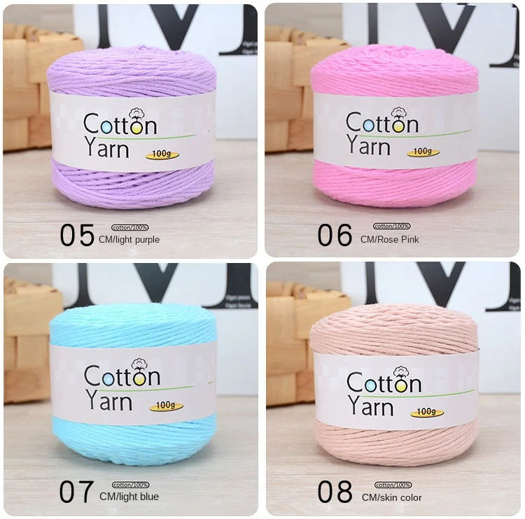 Eight skeins of 100% cotton yarn in various shades including purple, pink, and blue.