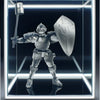 A silver articulated paladin action figure wearing armor and holding a shield displayed in a lighted box.