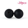 Two black silicone beads are shown against a white background.