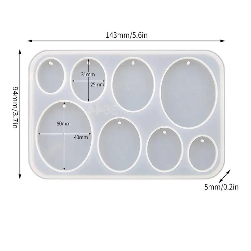 A white silicone mold set with multiple circular cavities for making epoxy resin earrings and pendants.