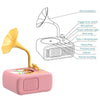 A pink kids interactive card reader story machine with a horn ornament and various controls.