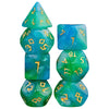 A set of seven glitter polyhedral dice in various colors and shapes, including a pyramid and cubes.