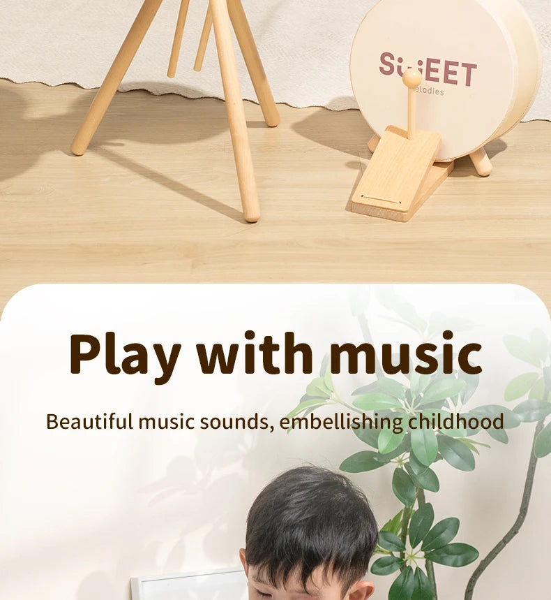 A wooden kids drum set with sticks is shown next to a text promoting playing with music and embellishing childhood.
