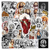 A collection of black and white Christian faith stickers featuring Jesus, saints, and religious symbols.