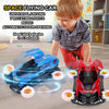 A young boy is playing with a blue and red transformable stunt car that features rotating lights and automatic door opening.