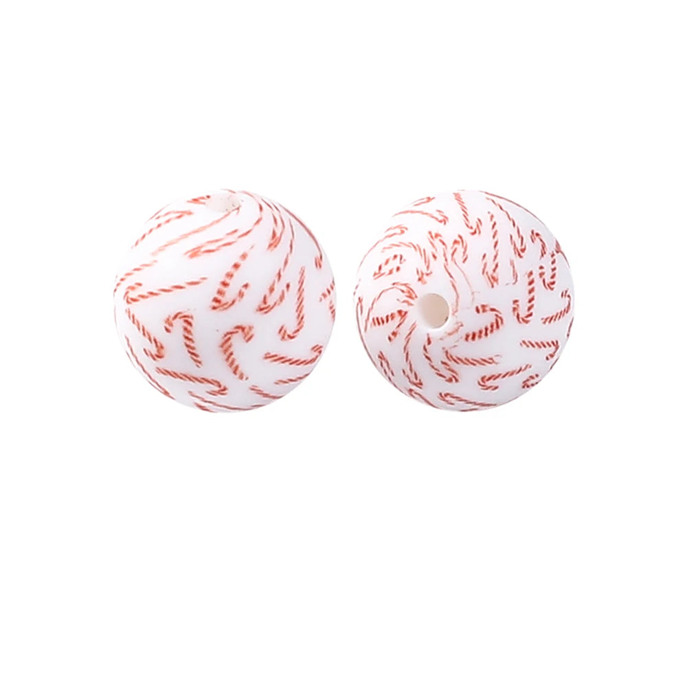 Two white silicone beads with red twisted patterns for jewelry making and crafts