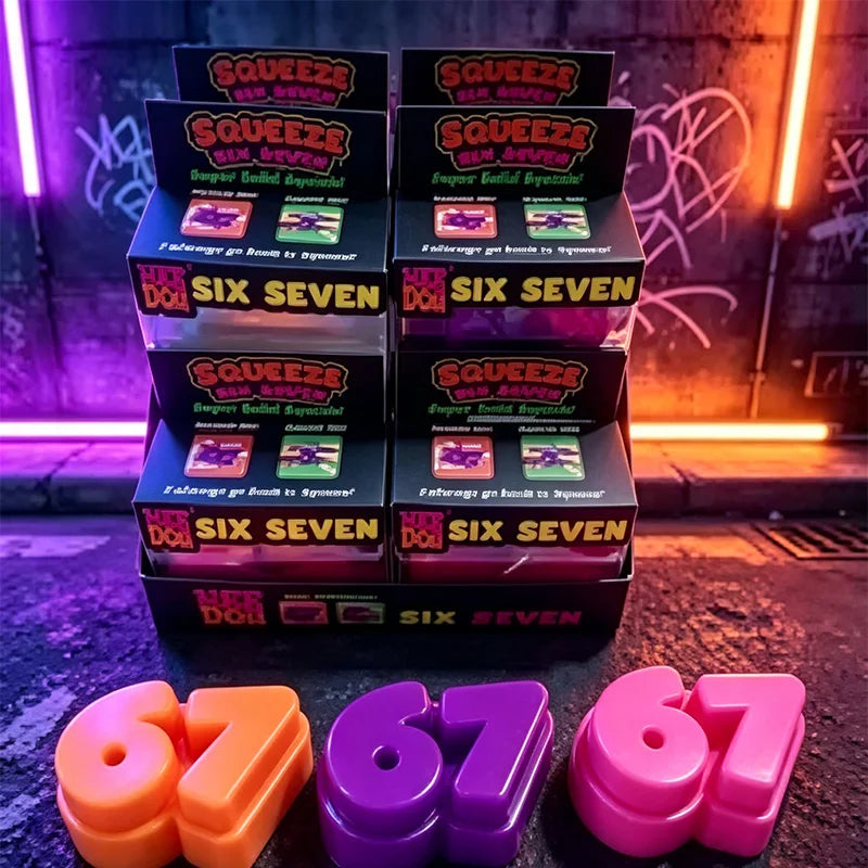 A collection of Squeeze stress relief toys in various colors and sizes, including orange, purple, and pink.