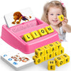 A pink matching letter game set featuring yellow letter blocks and a lion toy for educational spelling practice.