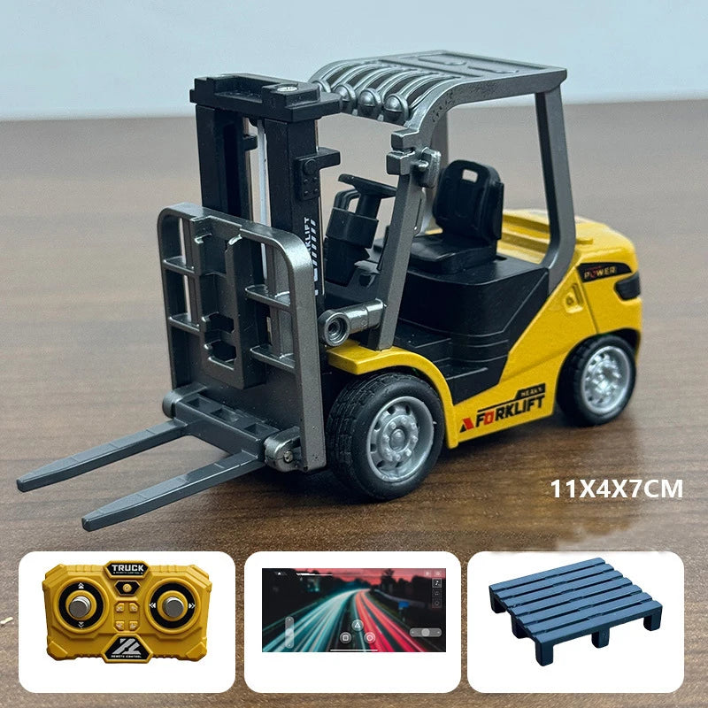 A yellow 1:64 scale remote control forklift excavator toy with a gray protective cage and a black seat.