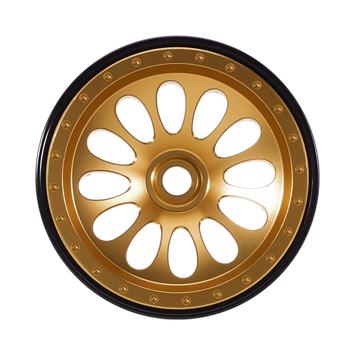 Gold aluminum beadlock wheels with black rim and spokes for an SCX30 vehicle.
