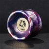 A purple and blue metal yo-yo with a stylized horse design on the lid.