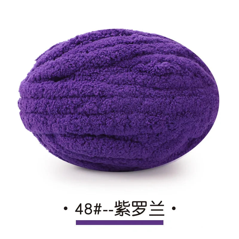 Purple chunky chenille yarn ball for hand knitting projects