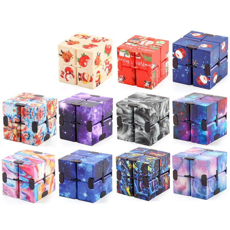 A collection of colorful and dark patterned fidget cubes in various box designs.